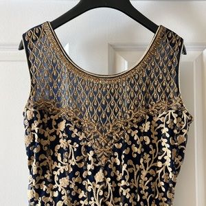 Gorgeous Indian gown with heavy thread work on a dark navy base